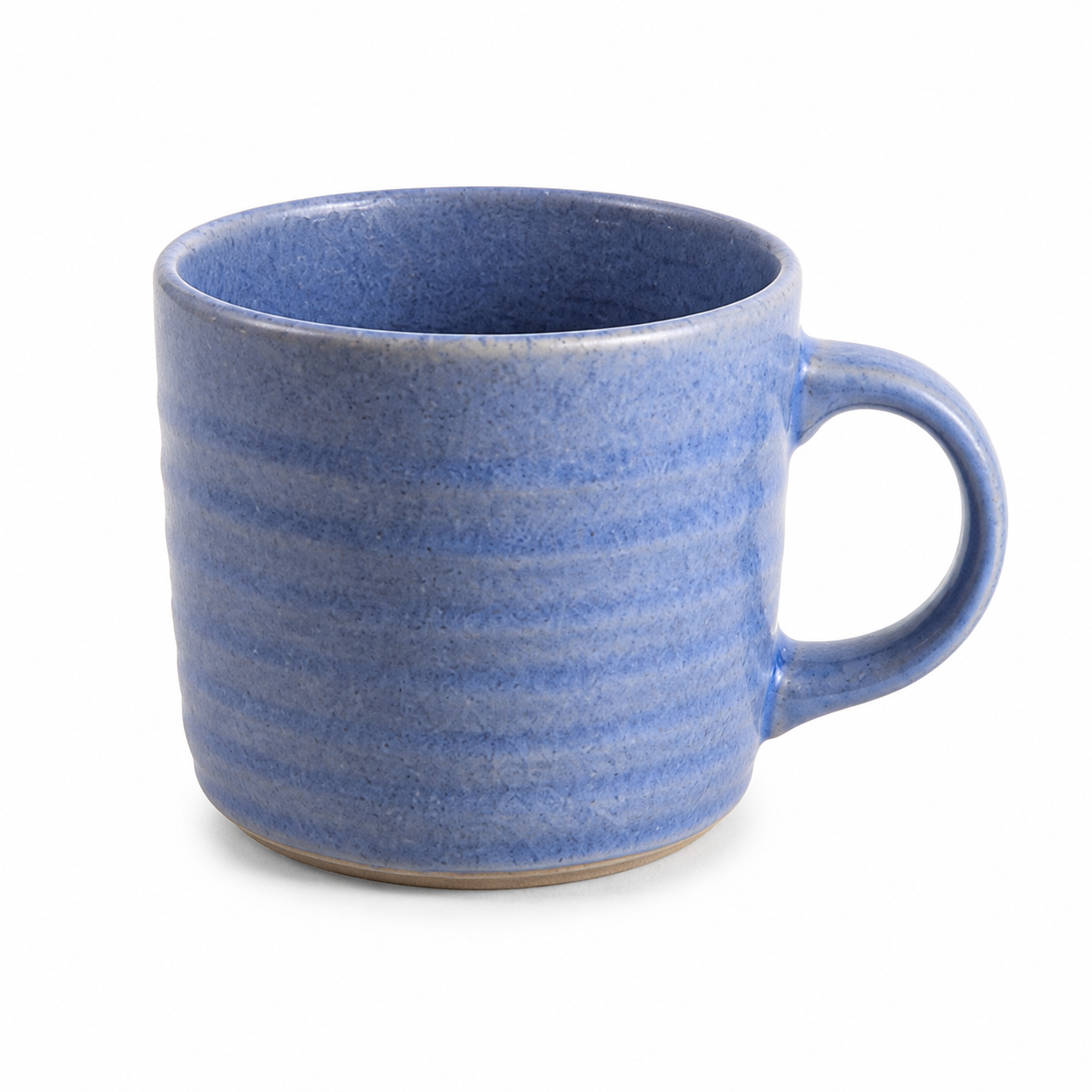 Demo photo of the same speckled blue ridged stoneware mug as a clean catalog hero shot, centered on a pure white background with the handle to the right.